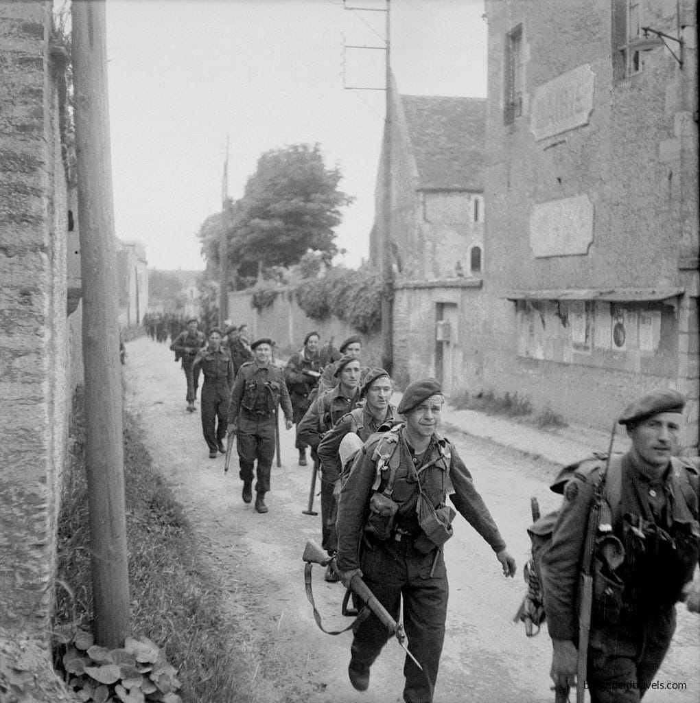 Commandos of the 1st Special Service Brigade moving inland after having landed on Sword Beach.