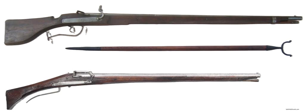 Comparison of the musket versus arquebus. The arquebus was the earlier and lighter form of firearm, designed to be fired from the shoulder. The heavy musket was introduced to penetrate armour and had to be fired from a forked rest. Top: German matchlock musket & rest, circa 1600. Length 1536mm, Bore: 18mm. Bottom: German matchlock arquebus circa 1560. Length 1320mm, Bore: 16.5mm