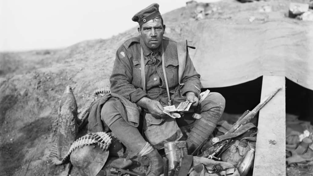 Private John Hines 'The Souvenir King' of 45th Battalion, Australian Imperial Force at Polygon Wood, September 1917. With a great haul of souvenirs!