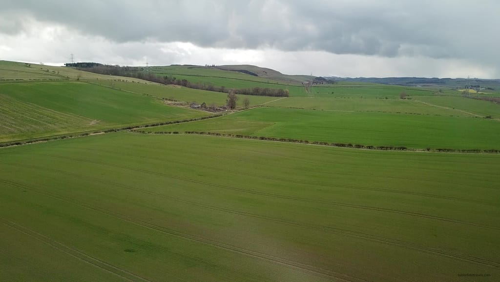 Aerial view across the Flodden battlefield. The Scots advanced from the ridgeline on the left. The English were on a lower ridgeline on the right, and they met in the boggy ground in the middle.