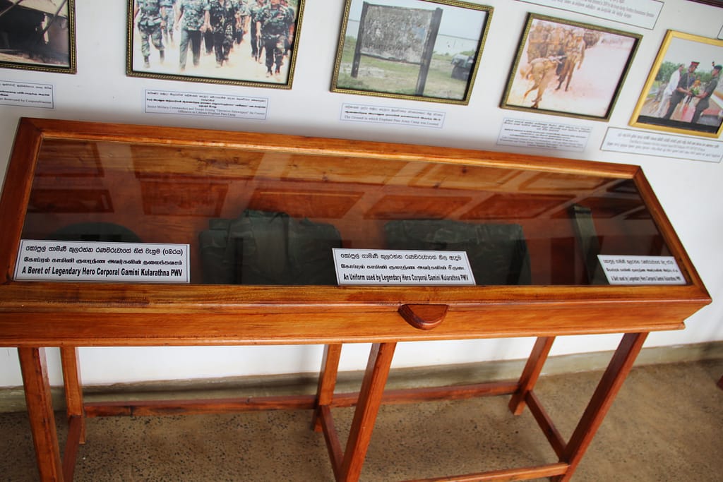 Lance-Corporal Gamini Kularathna's beret, uniform and belt, at the small Elephant Pass museum