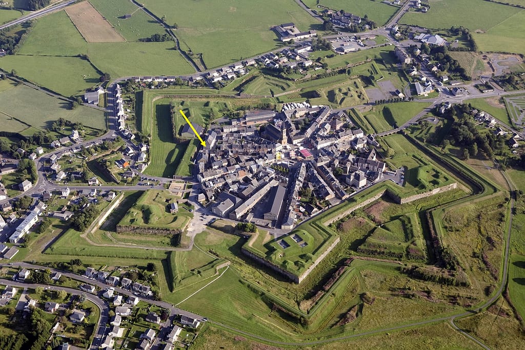 Aerial view of the bastion fortress of Rocroi. The fort was originally constructed around 1590 and later upgraded by Vauban. The yellow arrow marks the old Spanish officer's quarters that was our BnB.