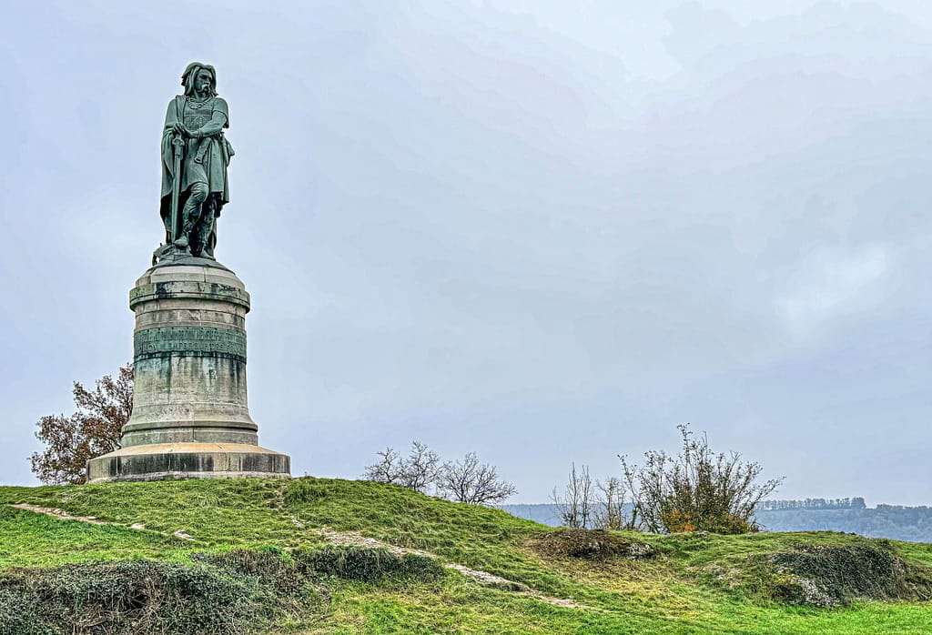 Statue of Vercingetorix at the western end of the hilltop, overlooking the village of Alise-Sainte-Reine
