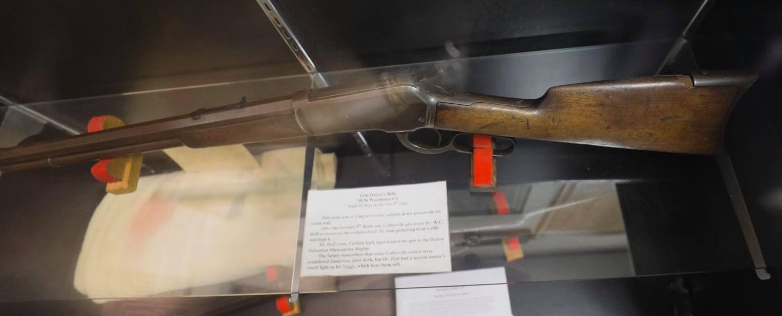 Grat-Daltons-Winchester-Model-1886.-This-is-the-gun-laying-across-the-dead-gang-members-in-the-photo