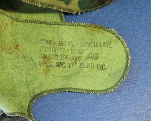 US Vietnam War era M1 helmet with ERDL cloth helmet cover