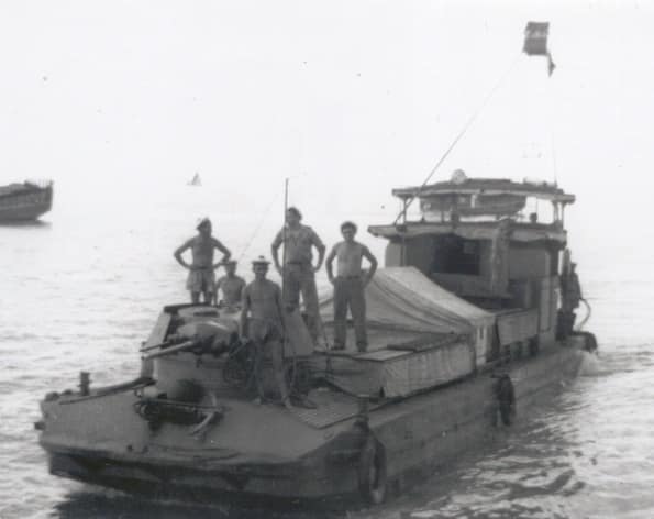 A heavily modified French Navy LCM (Landing Craft - Mechanised) of a Dinassaut Riverine unit