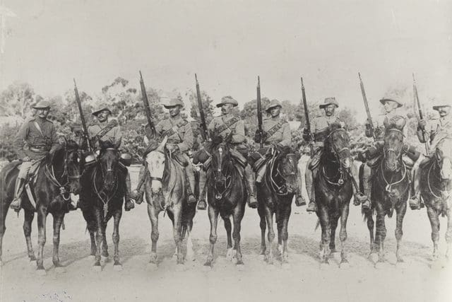 Anglo-Boer War - Captain (Capt) Edward Richman, and seven men of the 2nd South Australian (Mounted Rifles) Contingent. Image @ Australian War Memorial