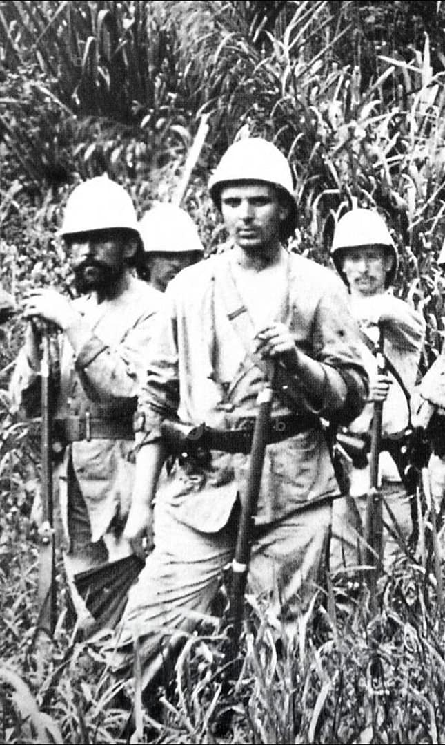French marines during the Tonkin Campaign. They are equipped with the Model 1874 Fusil Gras rifle. The Gras was a single-shot, bolt-action rifle firing 11mm blackpowder centrefire cartridges. In performance, it was similar to the British Martini-Henry and the American Springfield Trapdoor.