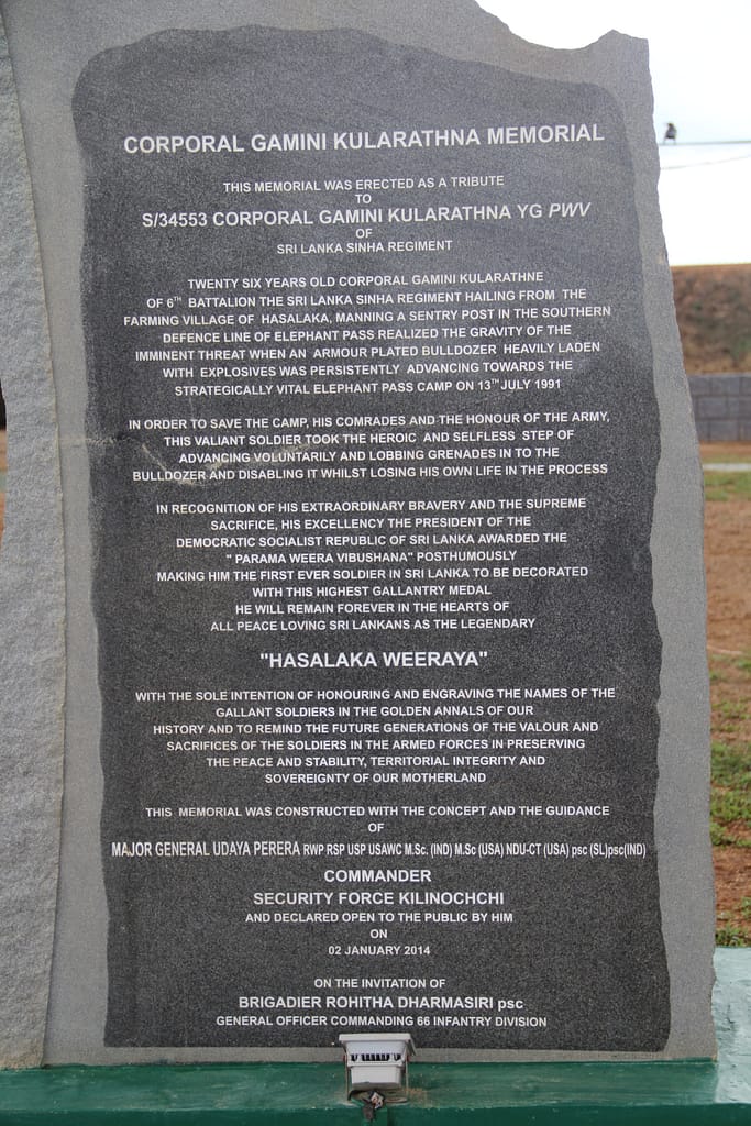 Monument to Lance-Corporal Gamini Kularathna, who single-handedly charged the explosive-laden armoured bulldozer, climbed the exterior, opened a hatch and flung two grenades into the interior, killing the Tamil Tiger crew and disabling the dozer. For this action, LCPL Kularathna was posthumously awarded the Parama Weera Vibhushanaya, the highest gallantry medal in the Sri Lankan Armed Forces - equivalent of a Victoria Cross or Medal of Honor.