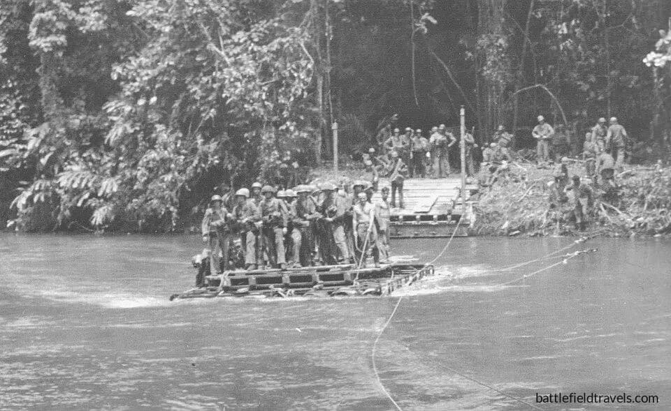 Marines cross the Matanikau River on a raft during the November offensives